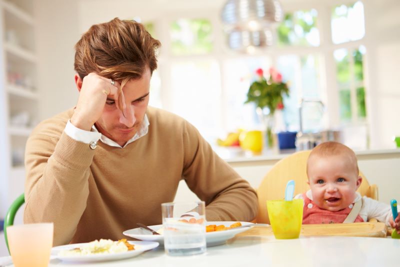 depressed-dad-sits-bewildered-with-his-son